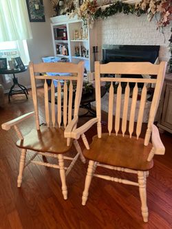 2 Sold oak arm chairs