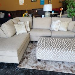 Ashley sectional with oversized ottoman and matching rug