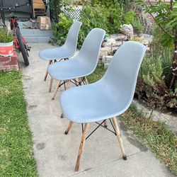 3 light blue mid century modern dining chairs