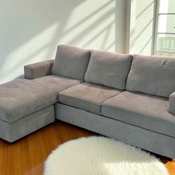Living Spaces Beige Sectional With Reversible Chaise 