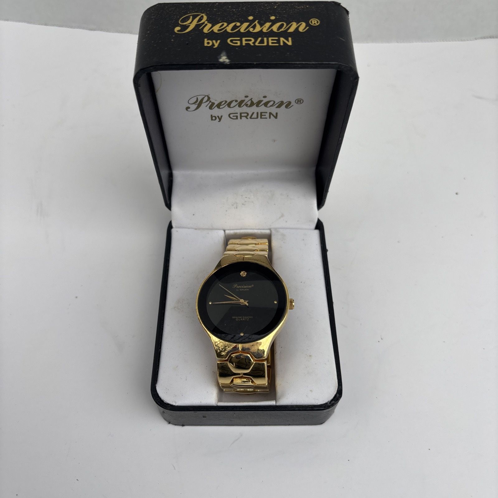 gold-tone "Precision" by Gruen quartz watch