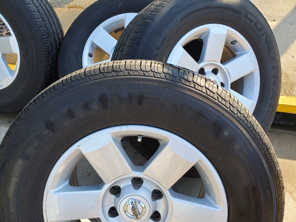 Rims and tires 2006 Nissan Aramda