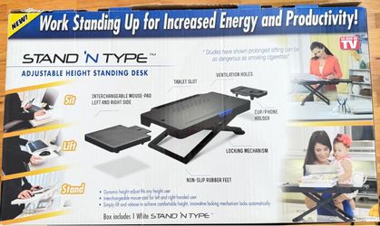 Adjustable height standing desk converter