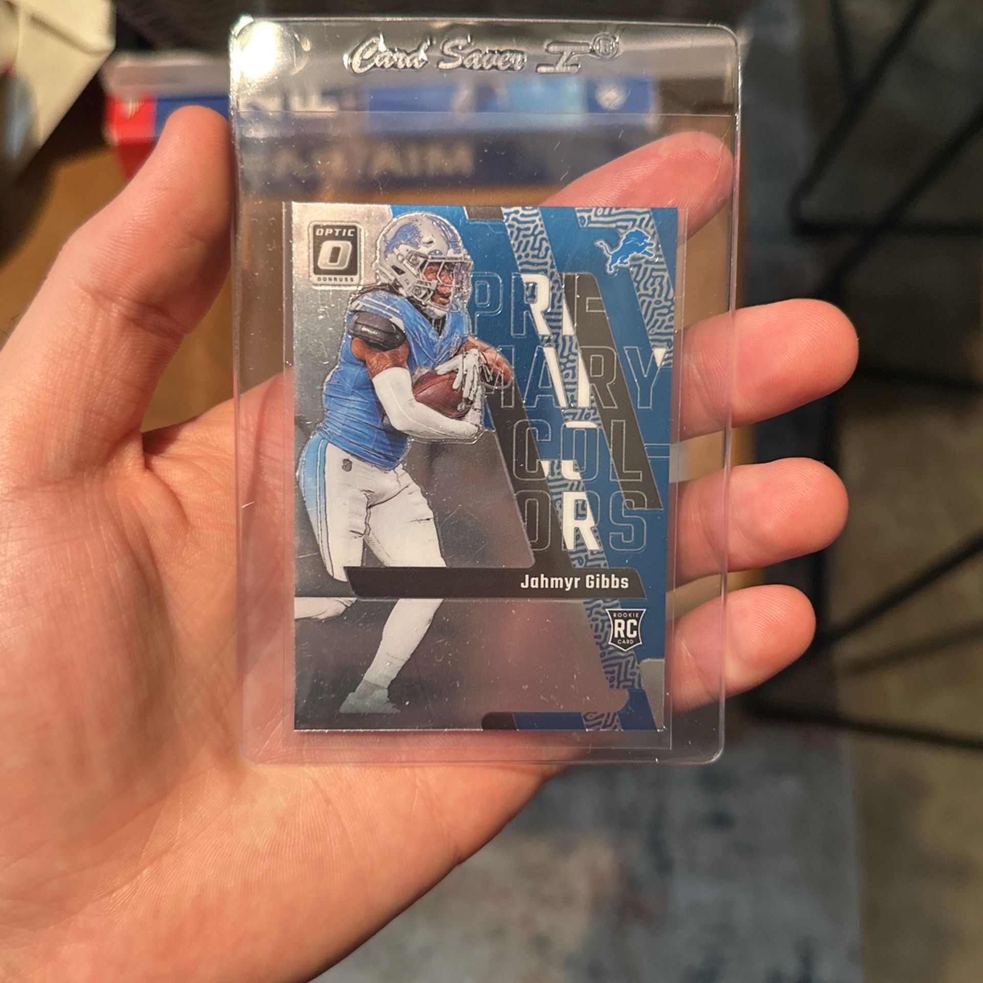Jahmyr Gibbs Donruss Optic Rookie Card + Score Barry Sanders Base + Mosaic Base Herman Moore 