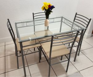 Dining Table with 4 Chairs – $50