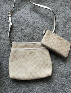 Khaki and white coach crossbody with wristlet