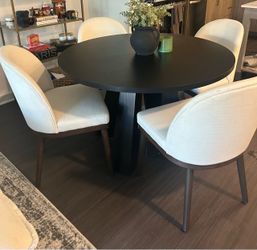 Round dining table with four  chairs- never used