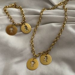 Necklace and bracelet with charms $20