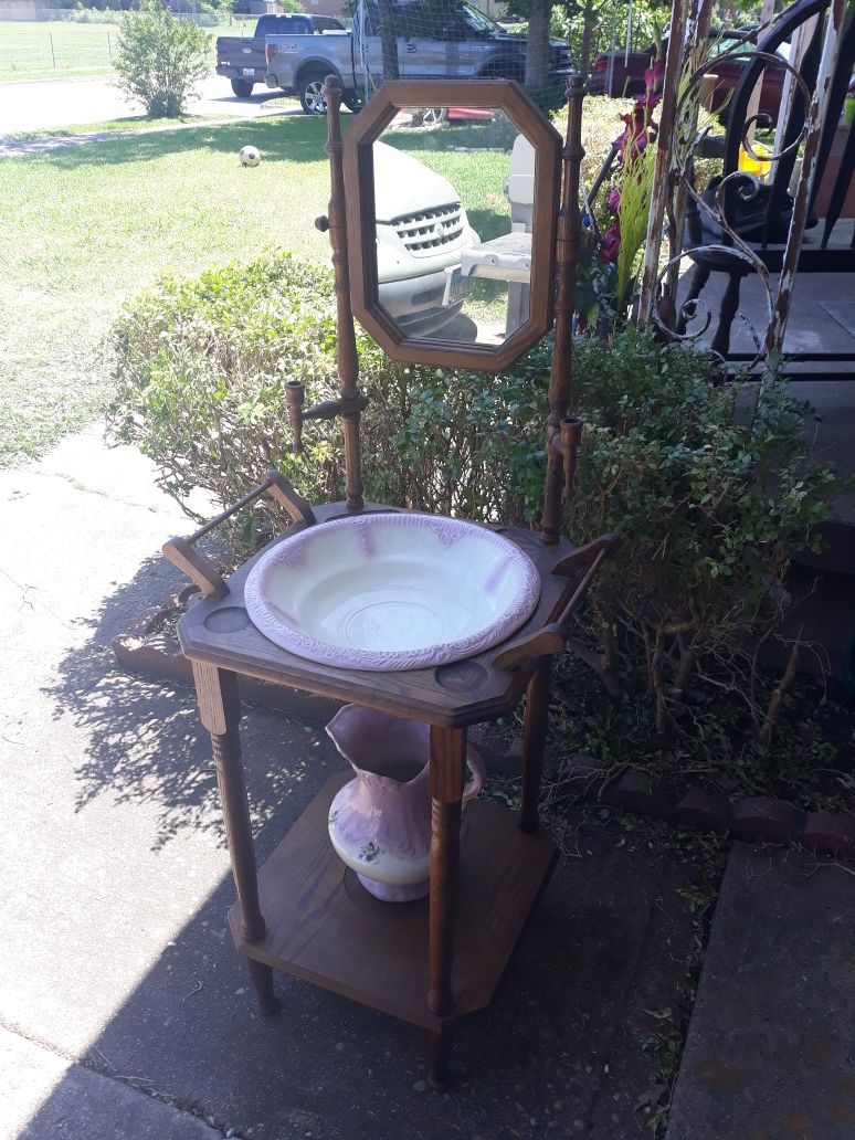 Antique wash stand with mirror.