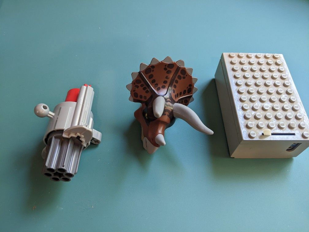 Lego Triceratops Head, Bionicles Blaster, And Battery Box