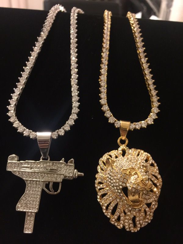 Fully loaded lion charm and fully loaded rifle charm 18kt gold plated