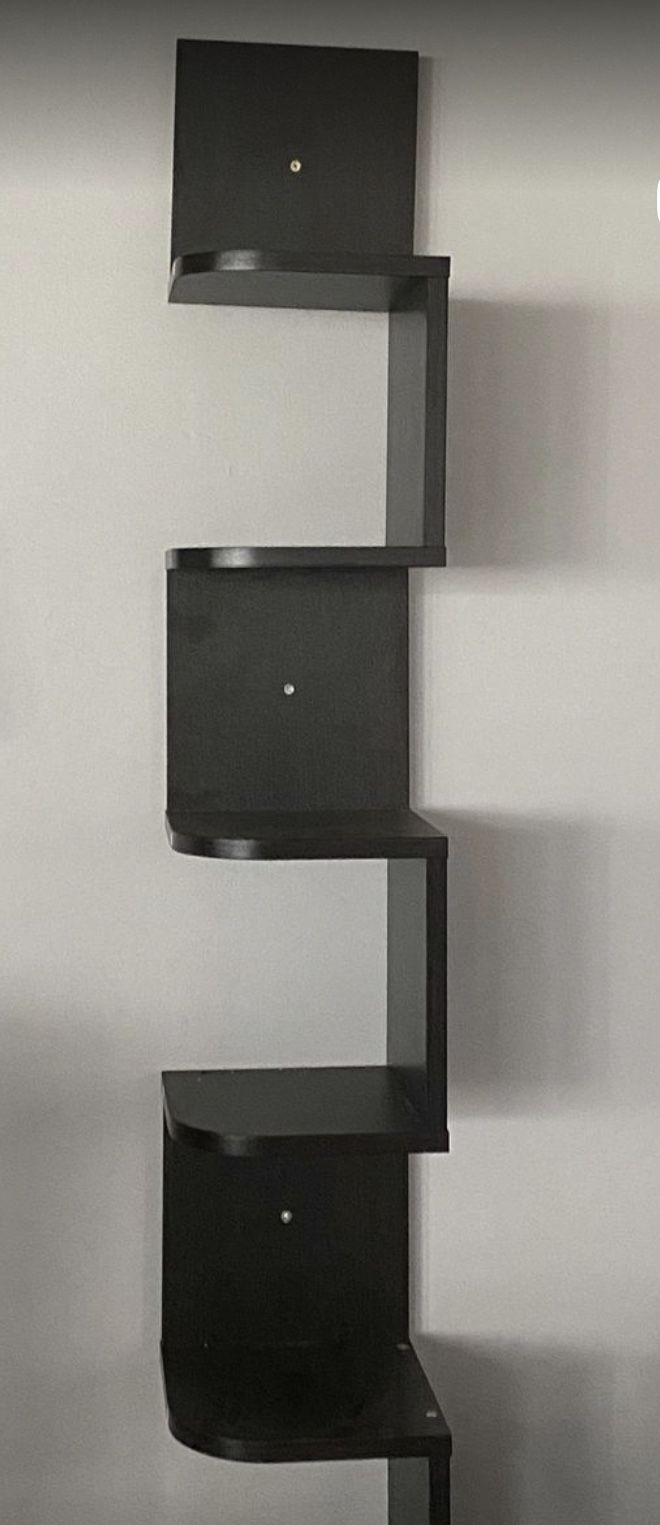 5 tier black wall shelf (New In Box). Assembly Required