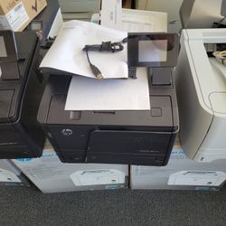 Printer.  Check PRINTER WITH MAGNETIC TONER  Laser