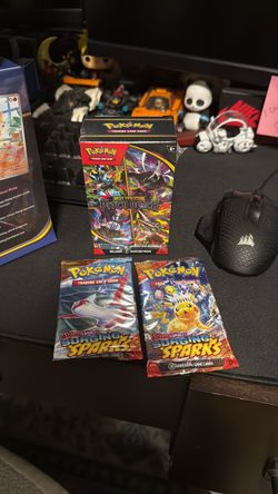 Pokemon Surging Sparks blister pack x2 and Pitch Black Booster Bundle