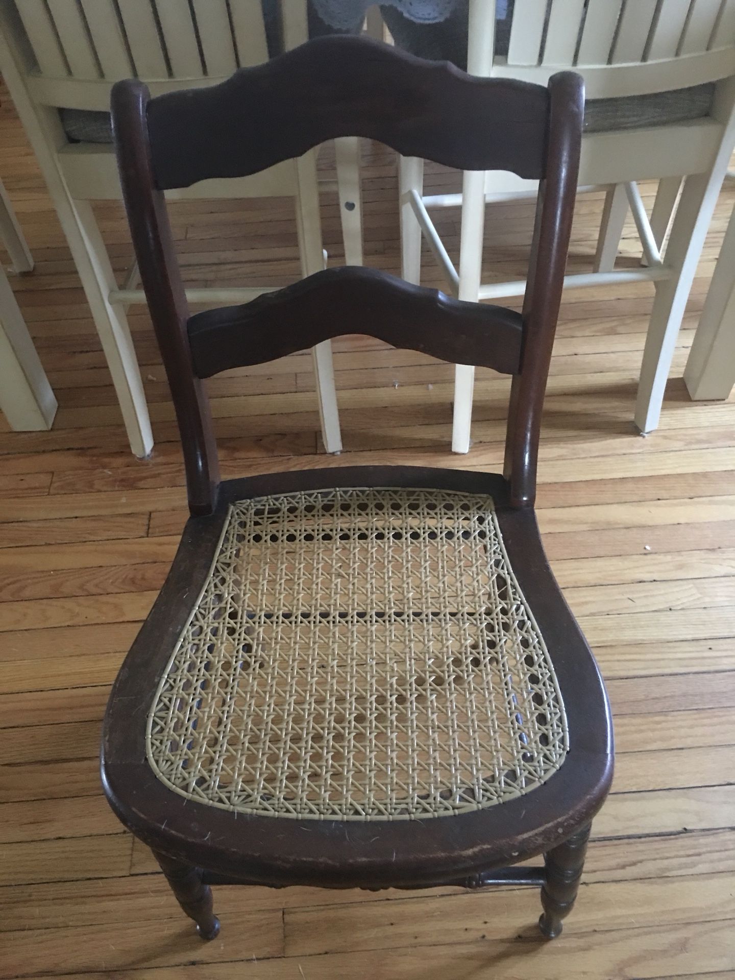 Small antique caned chair