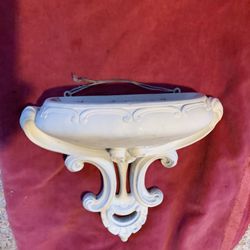 Small decorative wall sconce