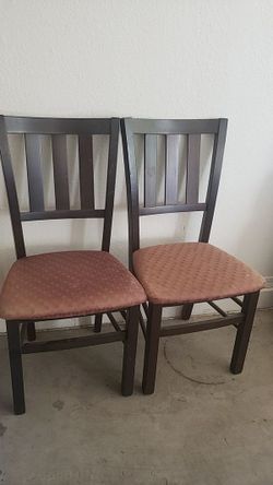 2 Brown Wooden Chairs