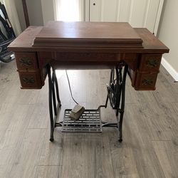 Vintage Sears Kenmore sewing machine with cabinet/table foot pedal and electric pedal in fair condition