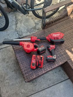 Milwaukee impact driver, compact blower, power head