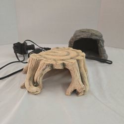 Reptile pacing and hiding rocks and heat white