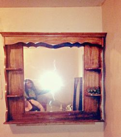 Wooden mirror with shelves