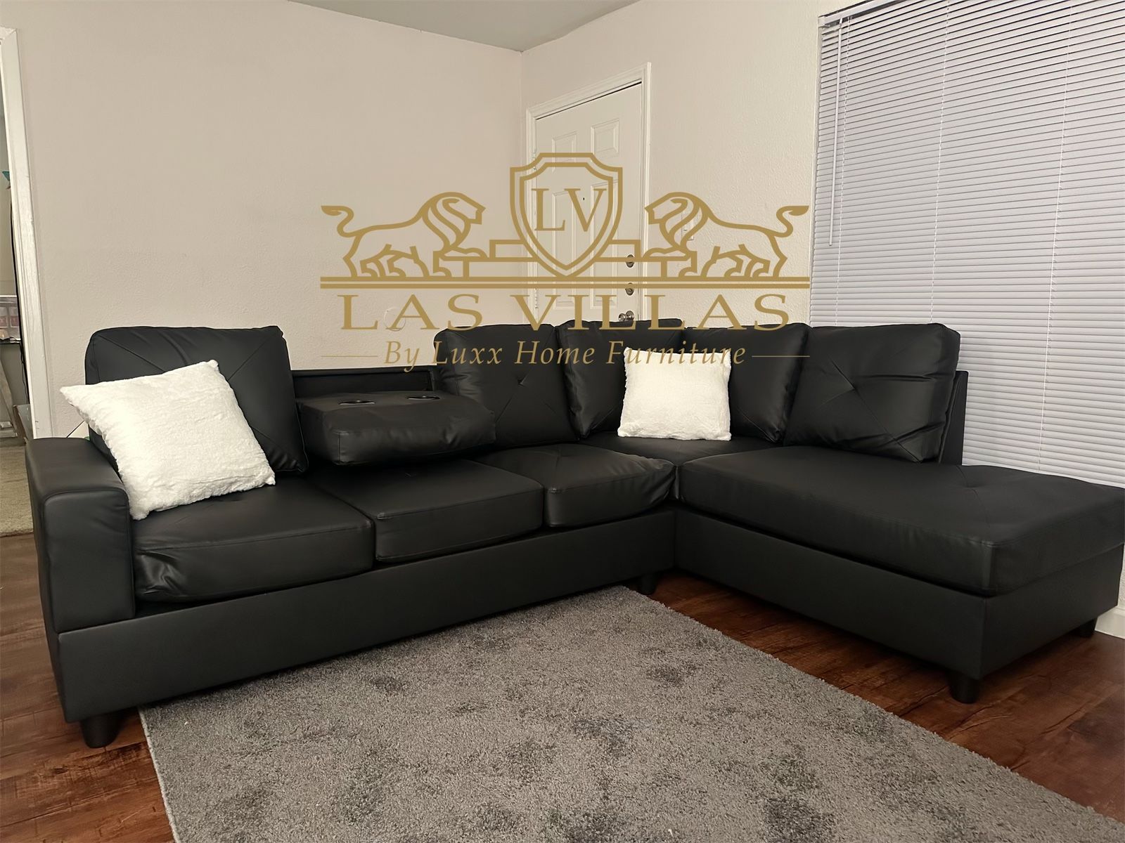 Brand New Rocket PU Reversible Sectional (Black) Dimensions: 102" x 74" x 37"H (OVERALL SECTIONAL)