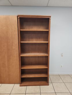 Two wooden bookshelves
