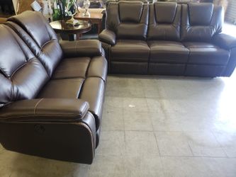 Brown leather power reclining sofa and loveseat