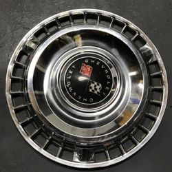 One 1961 Chevy Hubcap 