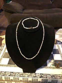 Real pearls and 14k gold necklace and matching bracelet