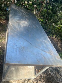 Steinless steel counter top desk 6 feet long and 2  1/2 feet wide