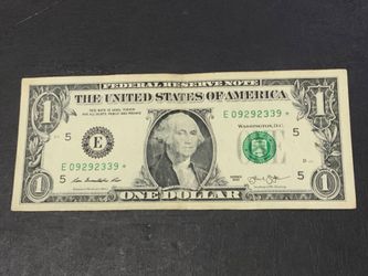 $1 star note with rare serial number.