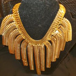 Gold tone cleopatra style 22-inch fringe necklace