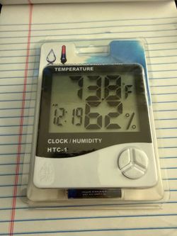 Clock, temperature and humidity measurement new sealed