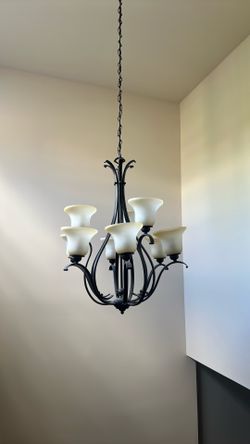 Stairwell chandelier must come professionally remove
