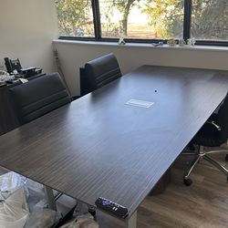 conference table with four chairs