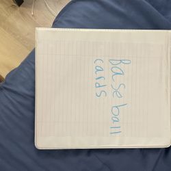 binder of baseball cards 
