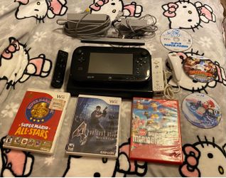 Wii U + 2 Wii Controllers + Games + Nunchuk