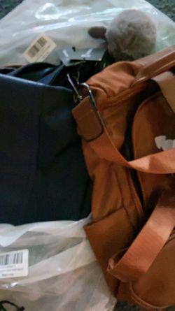 Womens shoulder bag/backpack with waterproof lining($10 each