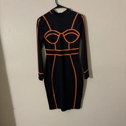 elegant black dress featuring striking orange accents