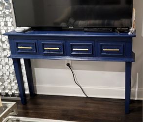 Navy blue console table with gold handles