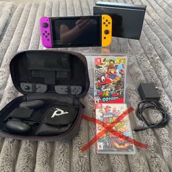 Nintendo Switch with Neon Magenta/Yellow Joy‑Cons  + 2 games 