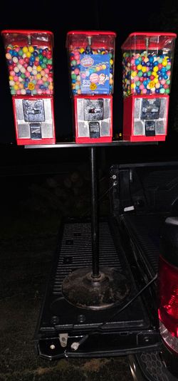 3 gumball machine stand.