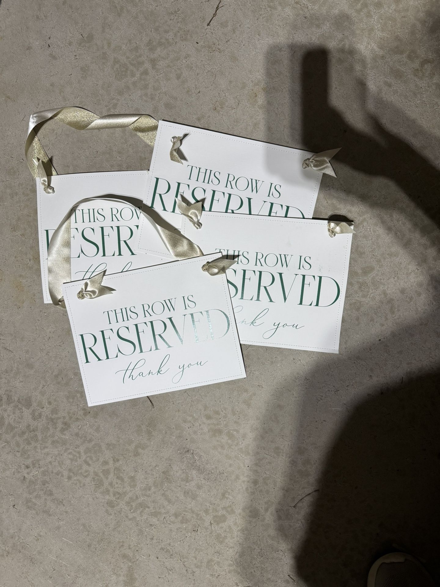 Four Vinyl Reserved Row Signs