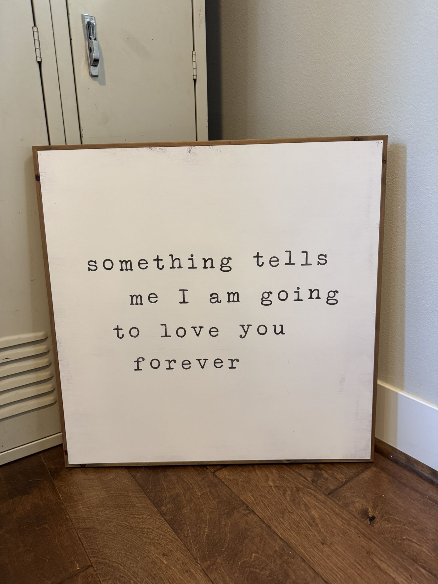 Something Tells Me Sign.