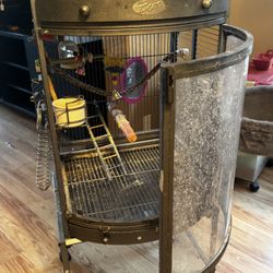 Metal bird cage with plexiglass front good for parakeets or cockatiels