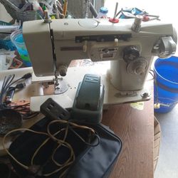 Sewing machine with flip pedal and seek