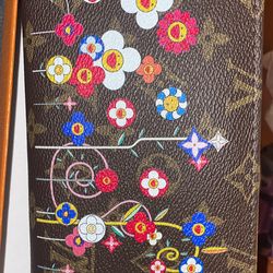 LV Takashi Zippy Wallet