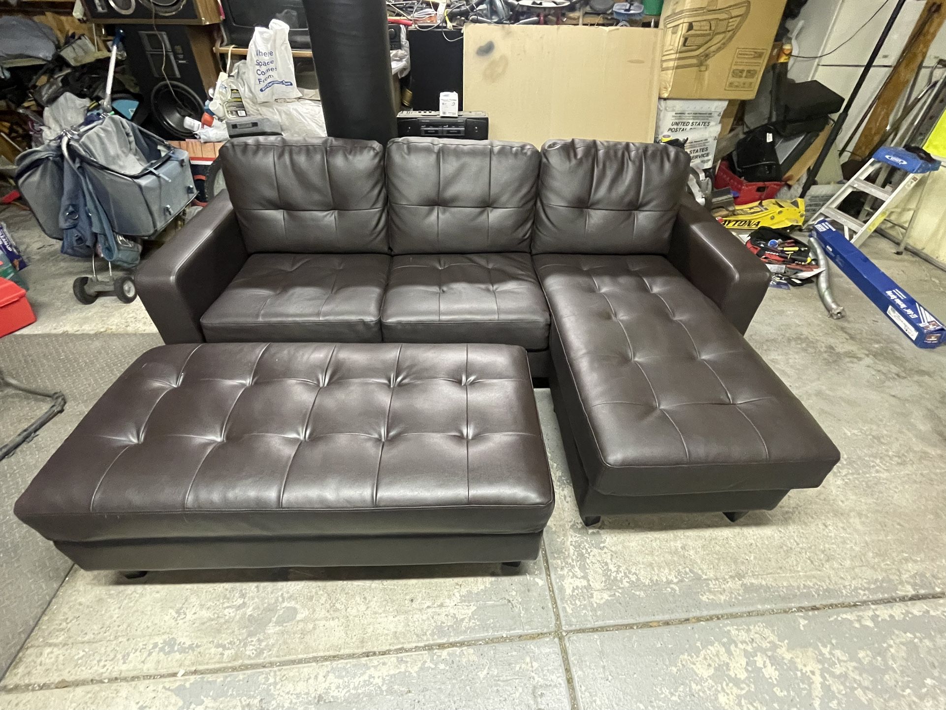 Abbyson-Claremont leather reversible chaise sectional sofa