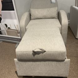 New accent chair with extendable ottoman by Serta